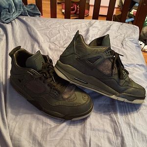 Jordan 4 black kaws want 650 but will negotiate price for new is (1,800)